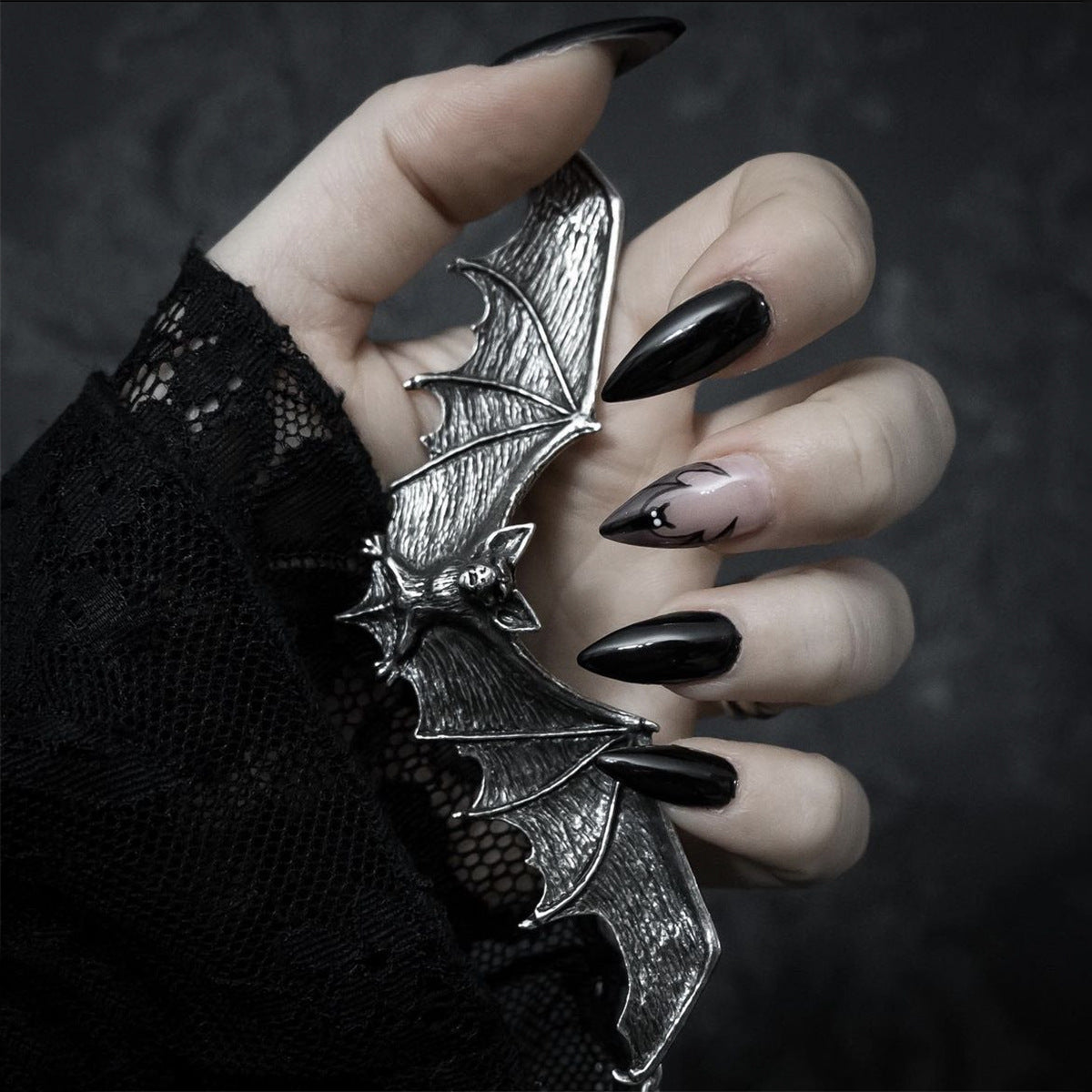 Gothic Elegance Long Stiletto Black and Pink Press On Nail Set with Bat Wing Design