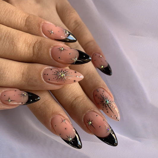 Cosmic Glamour Long Almond Nails in Beige Pink and Black with Starry Gem Accents