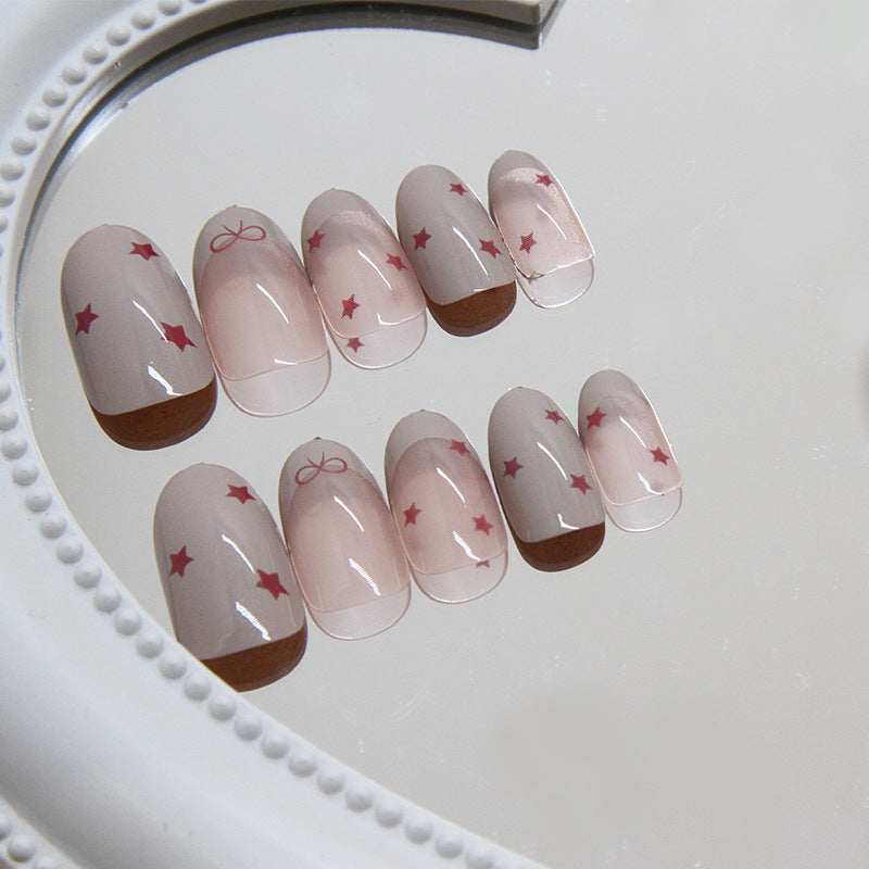 Celestial Dream Pink Oval Press On Medium Nail Set with Star Accents and Bow Detail