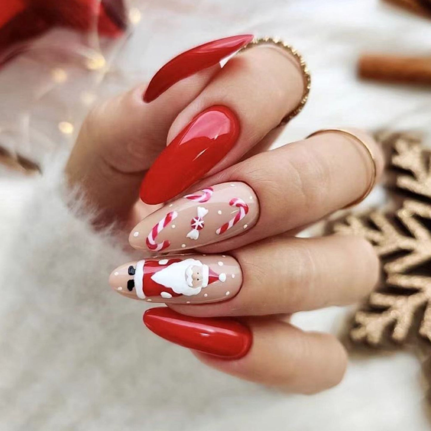 Festive Holiday Spirit Long Stiletto Red Press On Nails with Candy Cane and Santa Accent Designs