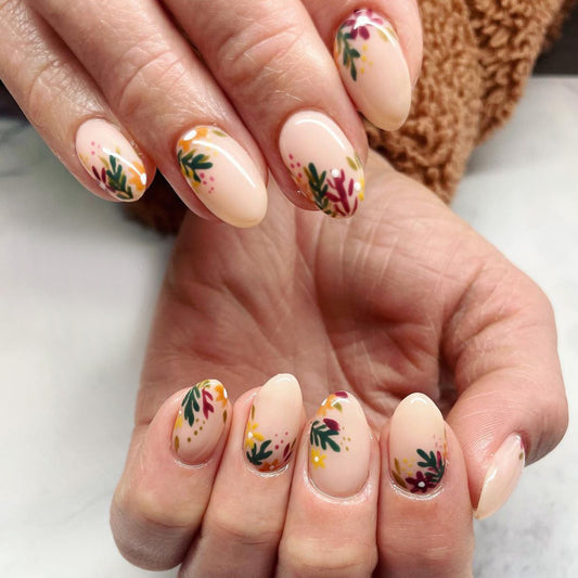 Boho Floral Bliss Almond Medium Length Peach Press On Nail Set with Green and Yellow Botanical Accents