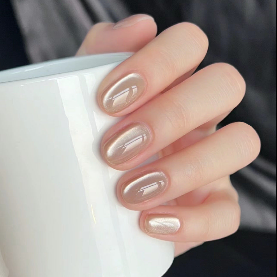 Elegant Serenity Medium Oval Beige Glossy Press On Nail Set with Shimmering Finish