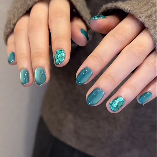 Ocean Breeze Medium Almond Press On Nail Set in Teal with Glittering Gemstone Accent