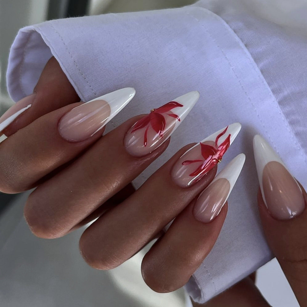 Tropical Floral Elegance Almond Press On Long Nail Set in White and Beige with Hand-Painted Red Flower Accents