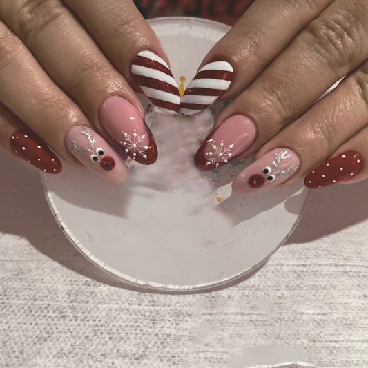 Holiday Cheer Almond Press On Nail Set Long Red Pink with Snowflakes and Reindeer Design