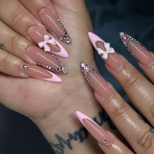 Chic Glamour Long Stiletto Pink Ombré Nail Set with Rhinestone Details and Bow Accents