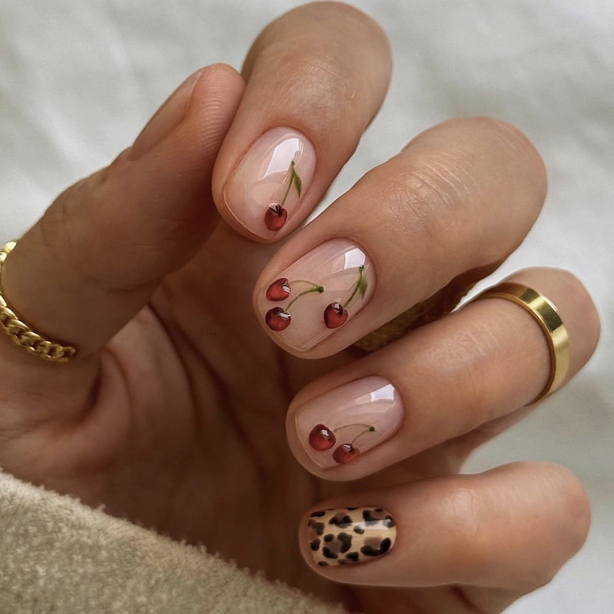 Cherry Blossom Dream Short Round Beige Press On Nails with Delicate Floral Art and Animal Print Accent