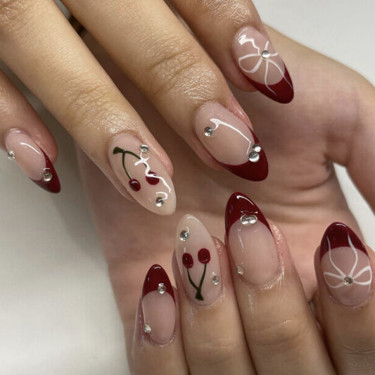 Cherry Blossom Elegance Almond Shaped Red and Beige Press On Long Nail Set with Floral Accents and Rhinestone Details