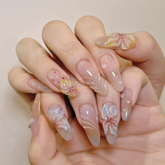 Garden Bliss Long Almond Press On Nail Set in Pastel Pink with Floral Designs and Water Droplet Accents