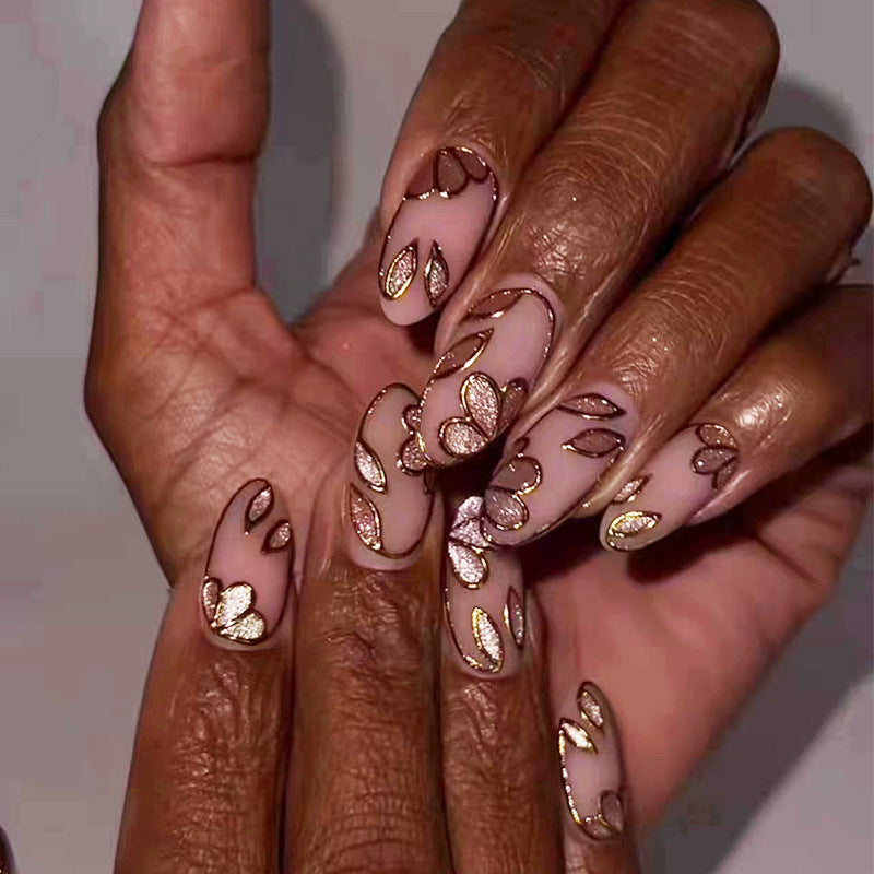 Elegant Floral Fantasy Long Almond Pink and Gold Press On Nail Set with Unique Leaf Design