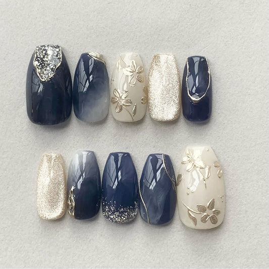 Nautical Elegance Long Coffin Midnight Blue and Cream Press On Nail Set with Gold Floral Accents and Glitter Finish