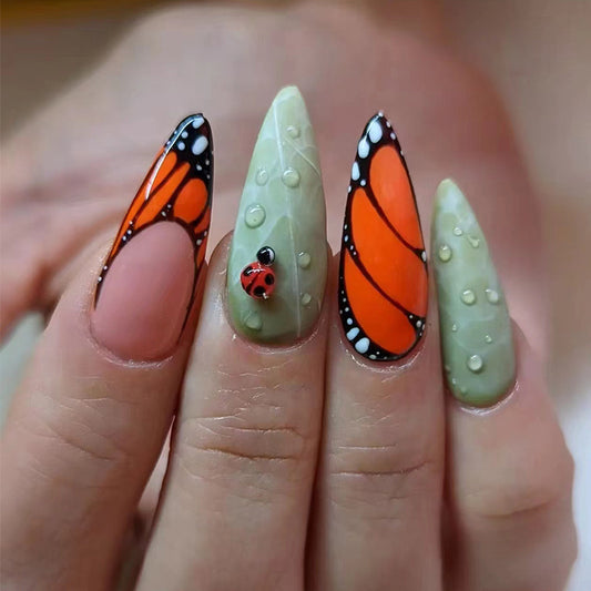 Butterfly Garden Long Stiletto Orange and Green Press On Nail Set with Ladybug Charm and Water Droplet Design