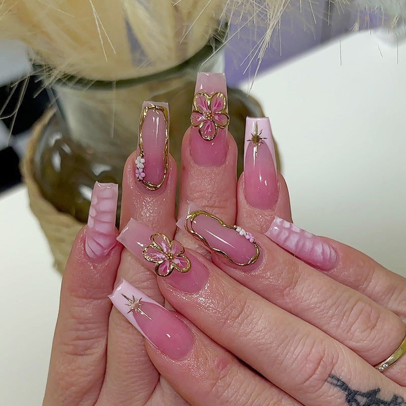 Dreamy Blossom Inspired Long Coffin Pink Press On Nail Set with Floral Details and Gold Accents