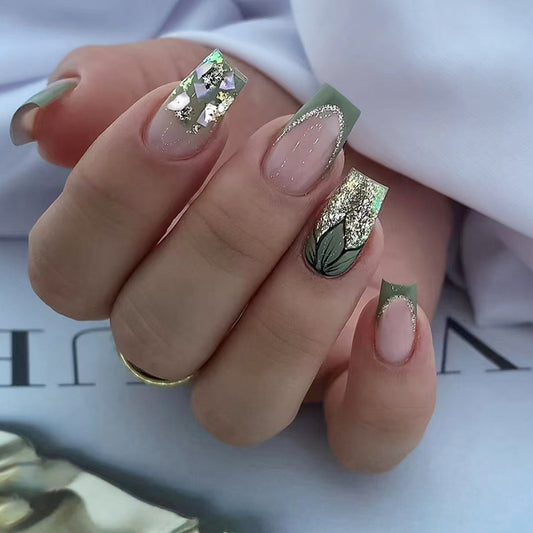 Garden Elegance Short Oval Press On Nails in Soft Green with Floral Accents and Sparkling Details