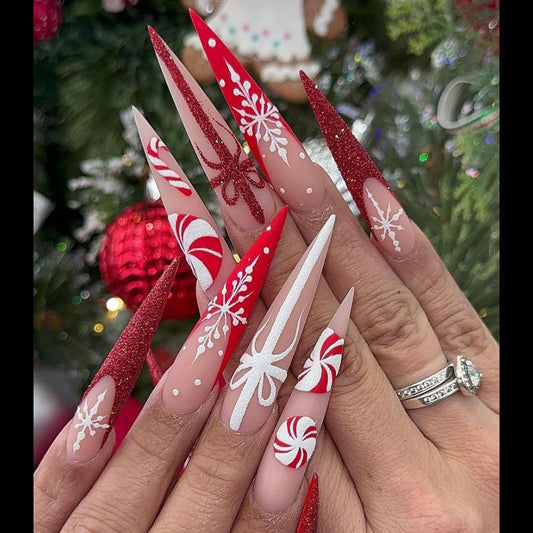 Candy Cane Wonderland Long Stiletto Red and White Press On Nail Set with Glitter and Christmas Snowflake Designs