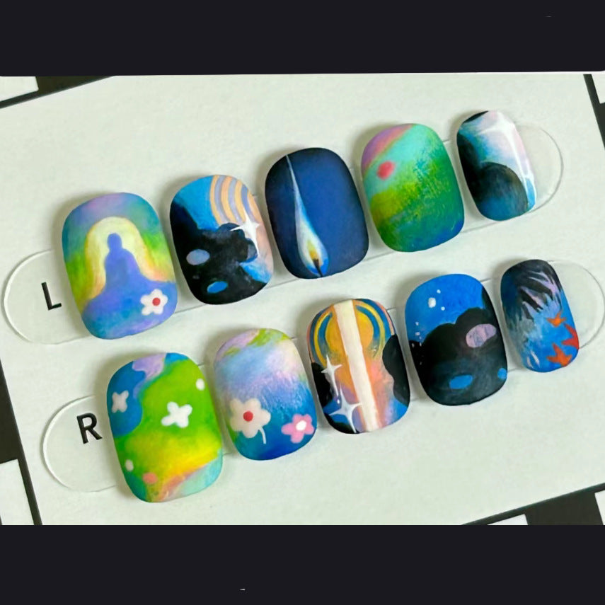 Cosmic Dreams Medium Square Multicolor Press On Nail Set with Artistic Galaxy Designs