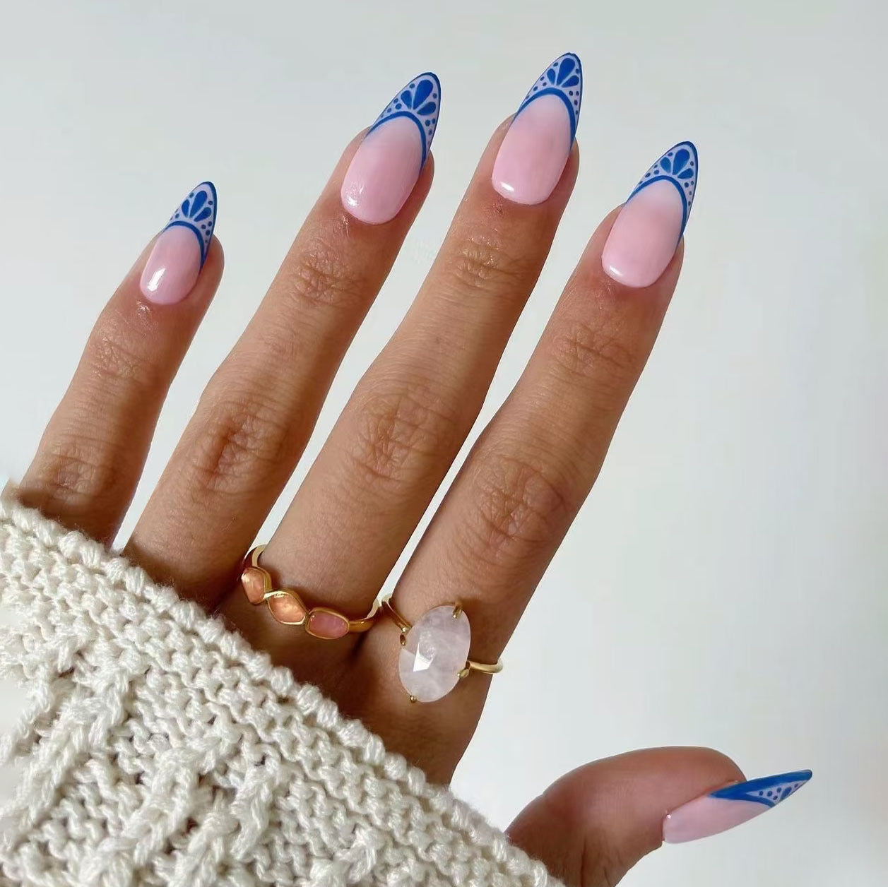 Elegant Ocean Breeze Long Almond Blue and Pink Press On Nail Set with Intricate Patterned Tips