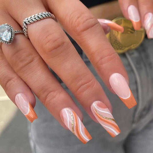 Sunset Bliss Long Coffin Orange and Beige Press On Nail Set with Glossy Swirl Designs and Gold Accents