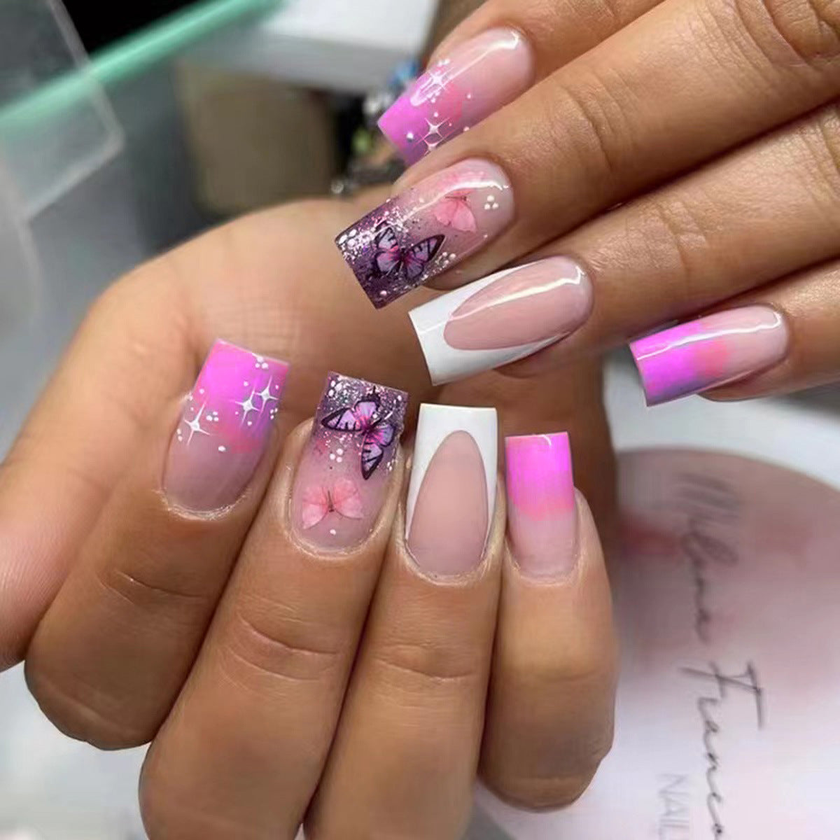 Whimsical Garden Long Square Press On Nail Set in Pink and Purple with Butterfly Designs and Glitter Accents