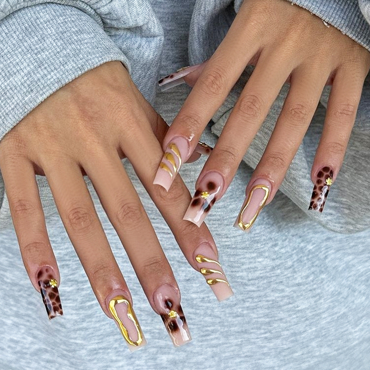 Chic Animal Print Glam Long Coffin Press On Nail Set in Beige and Brown with Gold Accent Designs