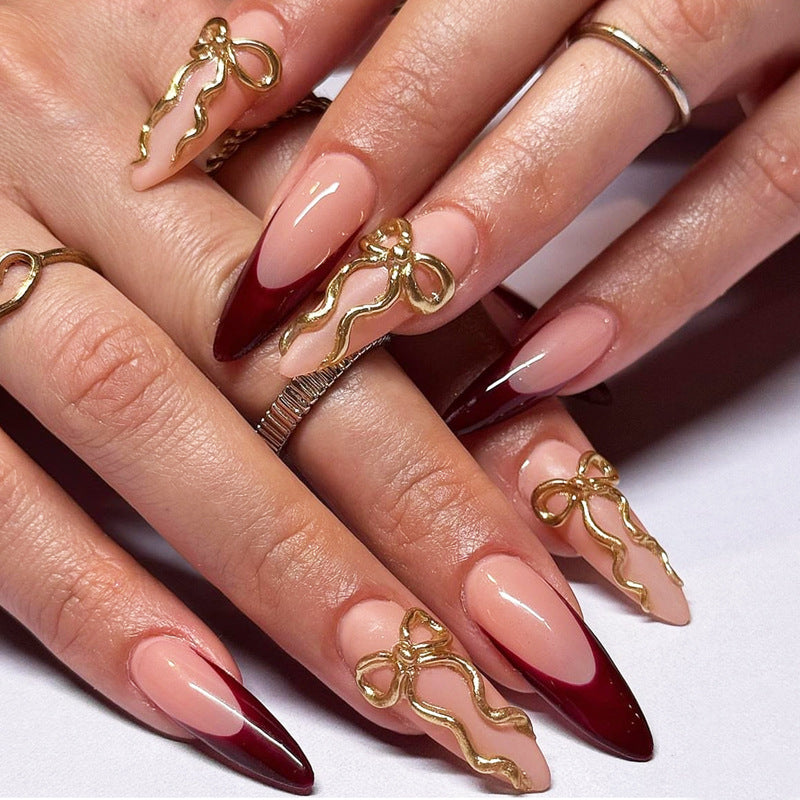 Chic Glamour Long Stiletto Press On Nail Set in Burgundy and Beige with Gold Bow Accent