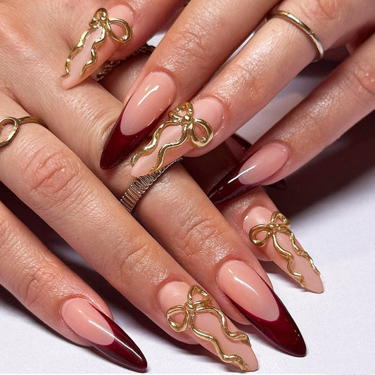 Chic Glamour Long Stiletto Press On Nail Set in Burgundy and Beige with Gold Bow Accent