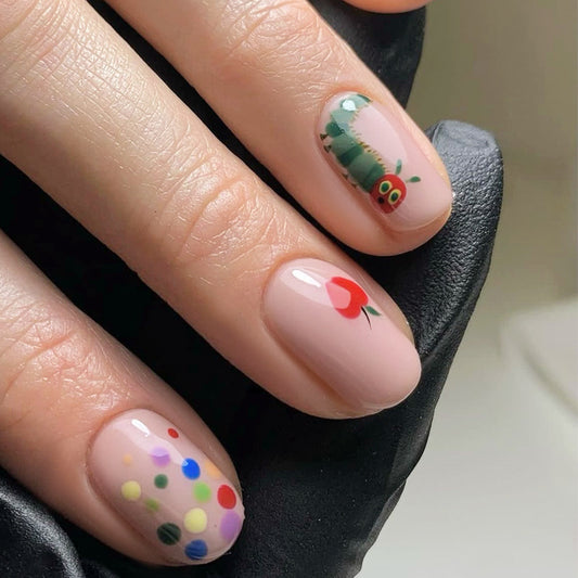 Enchanted Garden Short Length Oval Pink Press On Nail Set with Whimsical Caterpillar and Floral Accents