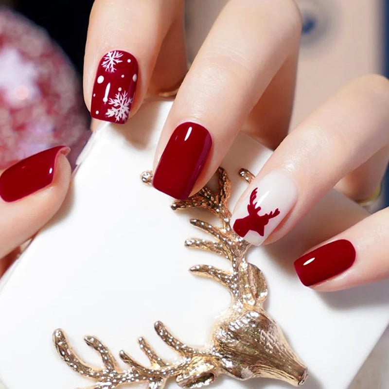 Festive Winter Wonderland Medium Square Deep Red Nails with Snowflakes and Reindeer Design