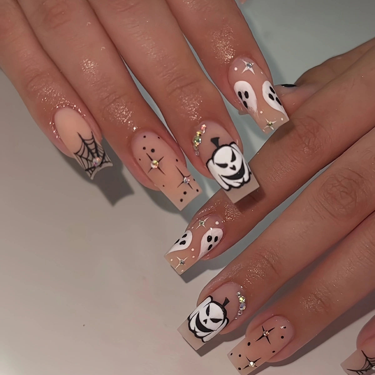 Spooky Halloween Themed Long Square Beige and White Press On Nail Set with Ghosts and Glitter Accents