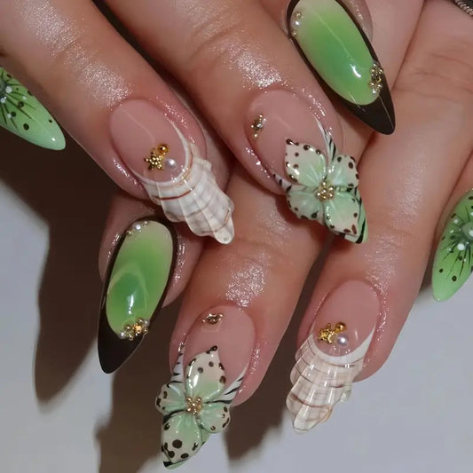 Tropical Paradise Long Stiletto Press On Nail Set Green with Floral Accents and Unique Shell Decorations