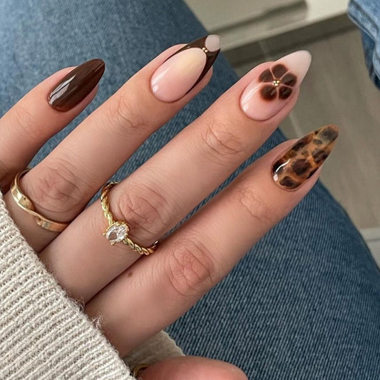 Wild Elegance Press-On Nail Set in Medium Almond Shape with Earthy Brown and Beige Color Palette Featuring Unique Floral and Animal Print Designs