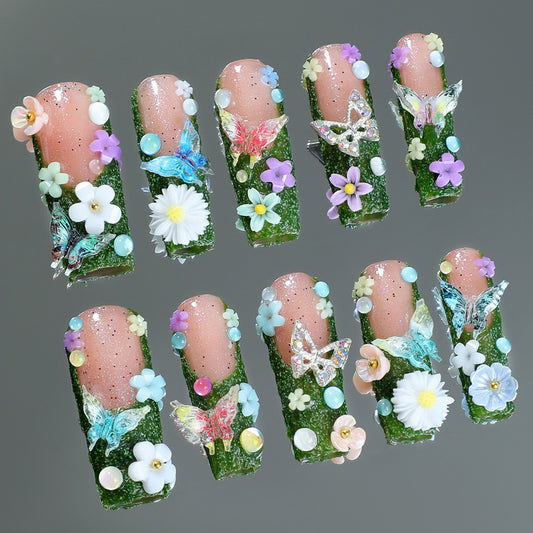 Whimsical Garden Inspired Long Square Green Glitter Press On Nail Set with Colorful Floral and Butterfly Accents