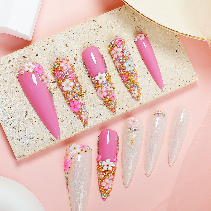 Whimsical Floral Fantasy Press On Nail Set Long Stiletto Pink with Sparkling Embellishments and Floral Accents