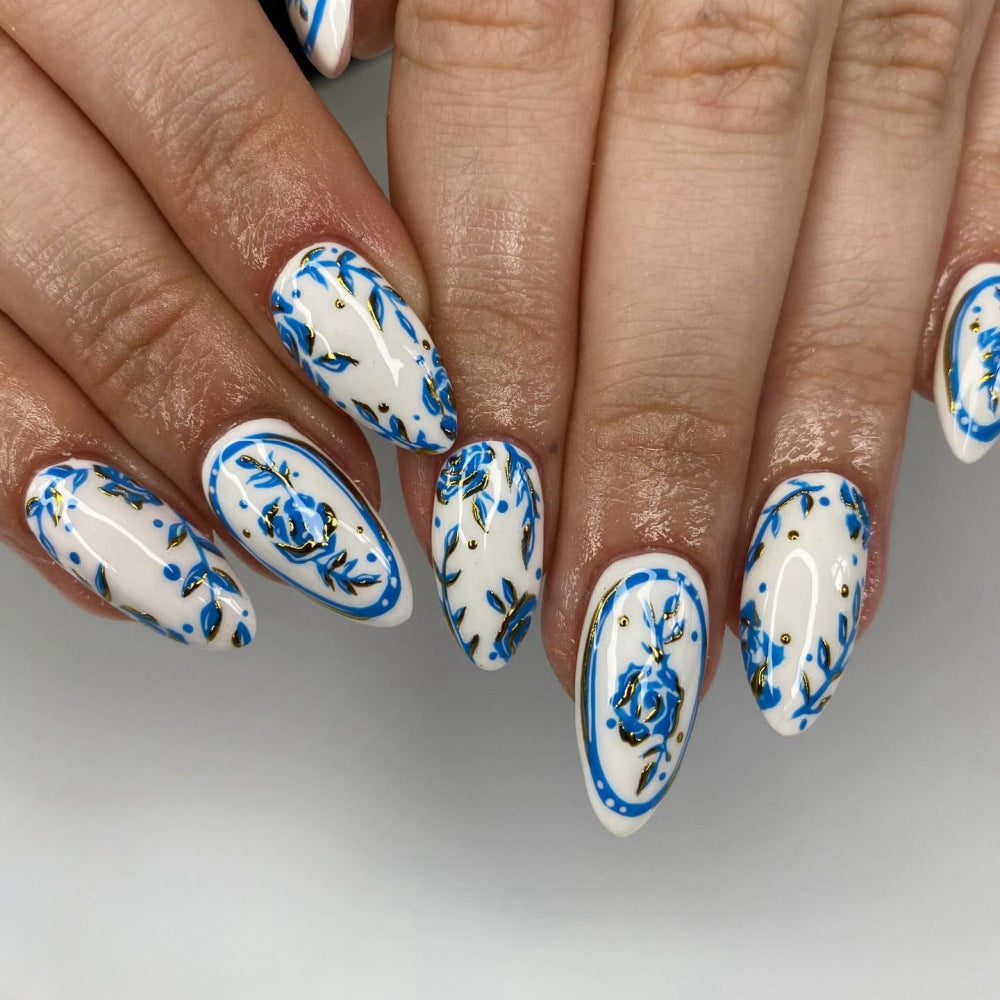 Elegant Garden Dream Almond Press On Nail Set long white and blue floral design with gold accents