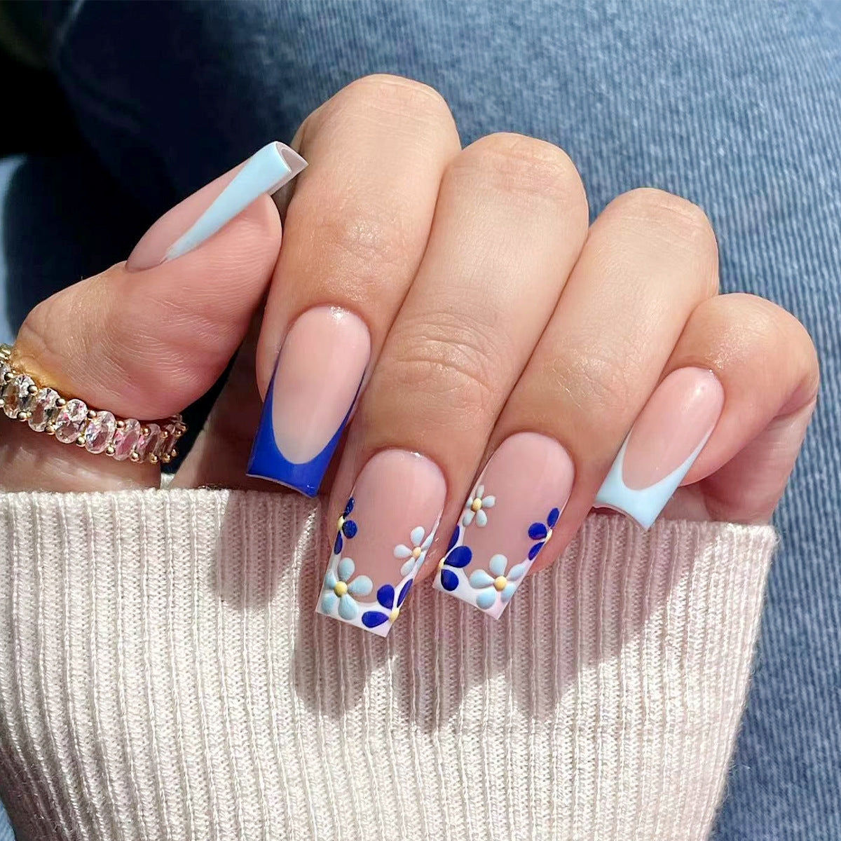 Denim Days Long Coffin Press On Nails in Sheer Beige with Cobalt Blue Tips and Daisy Chain Art