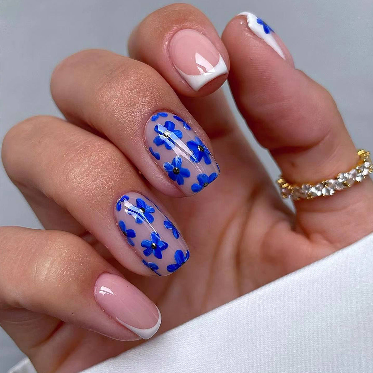 Spring Blossom Medium Round Blue and Pink Press On Nail Set with Floral Design