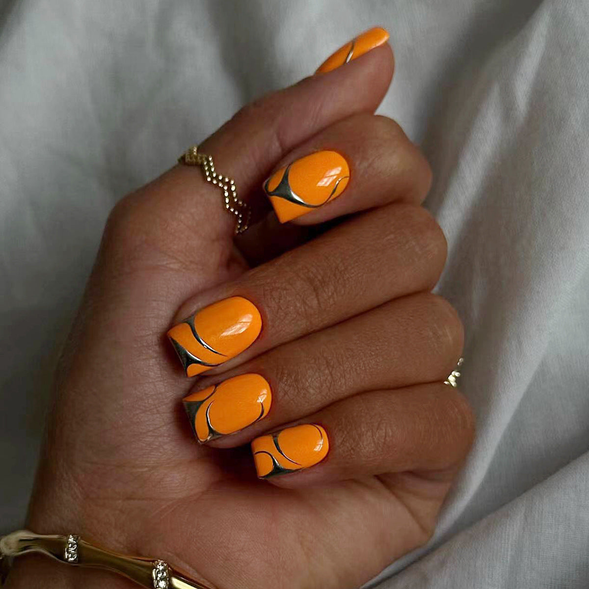 Vibrant Citrus Delight Medium Square Orange Press On Nail Set with Unique Swirl Design