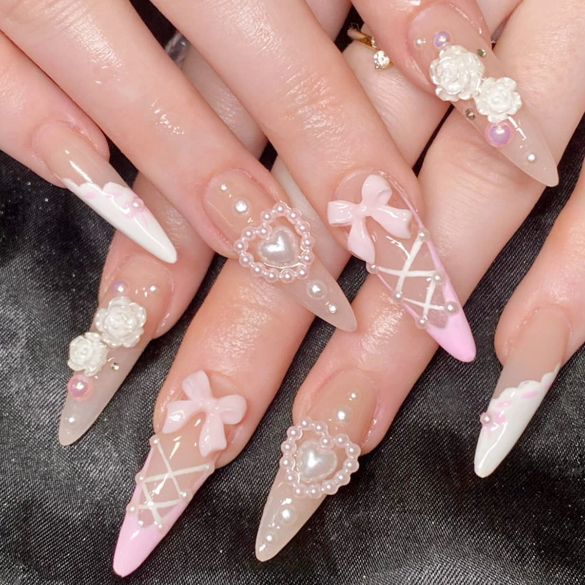 Chic Romance Long Stiletto Press On Nail Set in Soft Pink and White with Pearl and Bow Embellishments