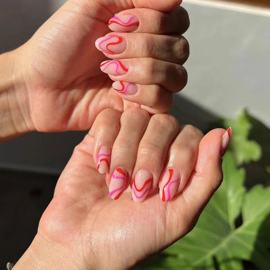 Swirling Sunset Almond Press On Nail Set Long Pink and Red Marble Design with Glossy Finish