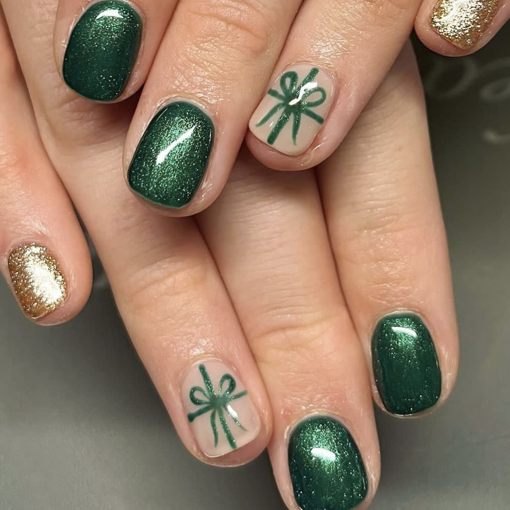 Festive Green Gift Box Square Short Press On Nail Set with Sparkling Gold Accents and Hand-Painted Bow Design