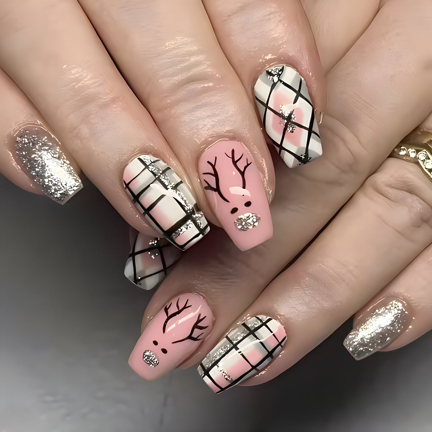 Winter Wonderland Long Coffin Press On Nail Set in Pink and White with Shimmery Silver Accents and Festive Reindeer Design