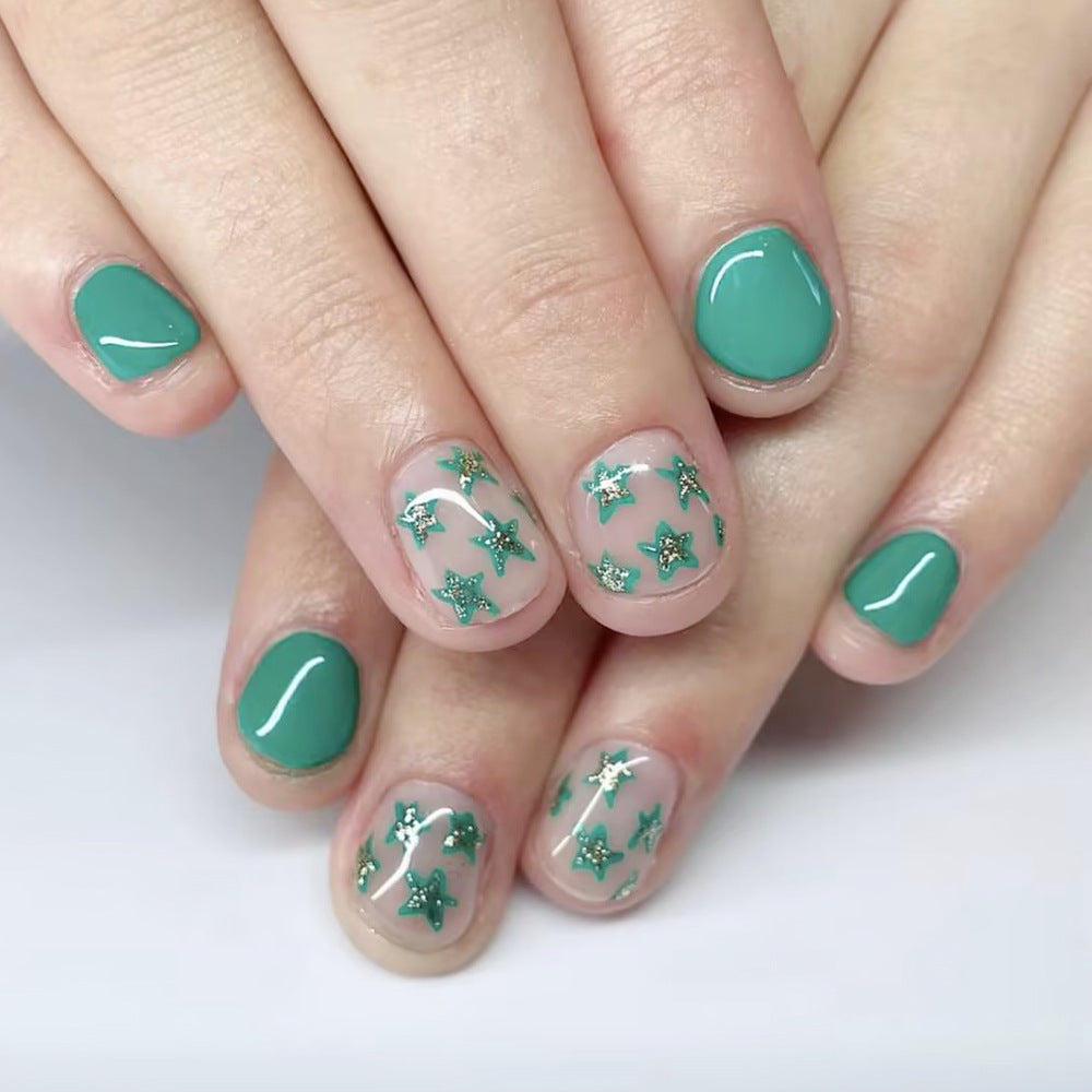 Celestial Dreams Short Oval Mint Green Press On Nail Set with Glittering Star Accents