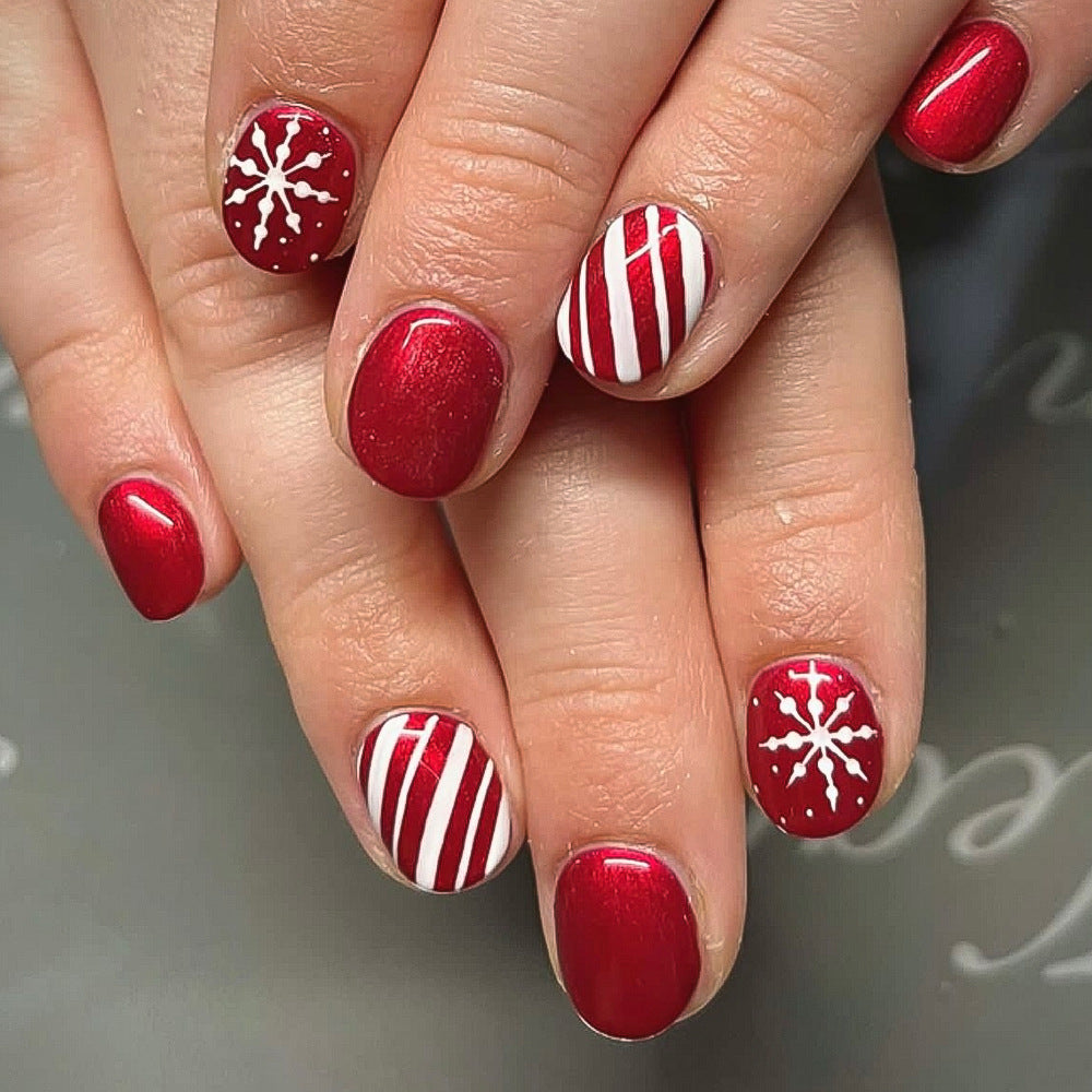 Winter Wonderland Oval Red Press On Nail Set Short Length with Snowflake and Candy Cane Design