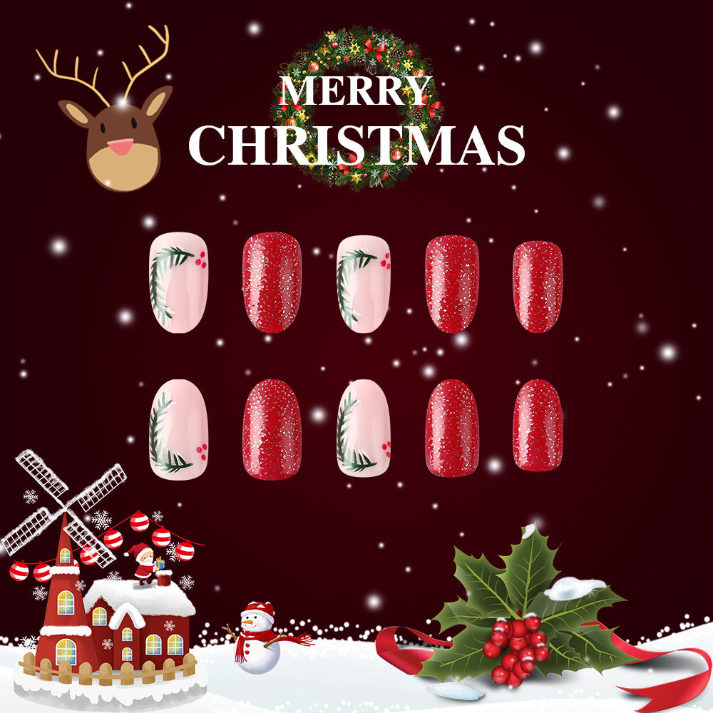 Festive Holiday Cheer Medium Oval Red and Pink Glitter Press On Nail Set with Winter Greenery Design