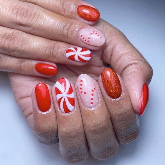 Festive Candy Cane Oval Press On Nail Set Medium Red and White with Glitter Accent Design