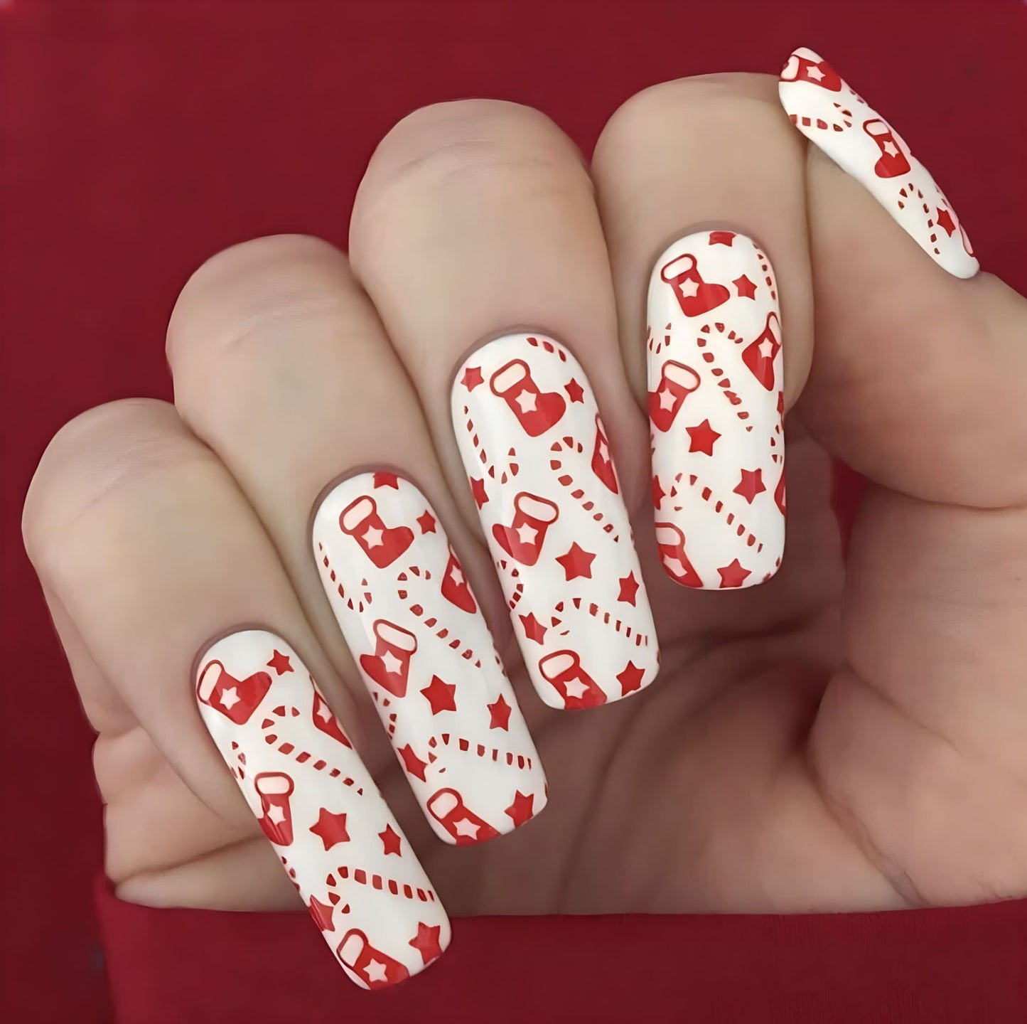 Festive Winter Wonderland Long Square Press On Nail Set in White with Red Candy Cane and Star Design Featuring Easy Application for Instant Glamour