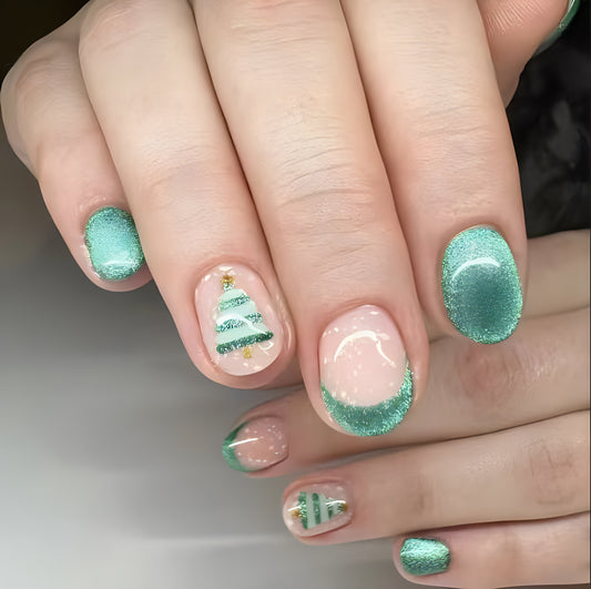 Winter Wonderland Press On Nail Set Short Oval Shape Mint Green with Glittery Christmas Tree Design