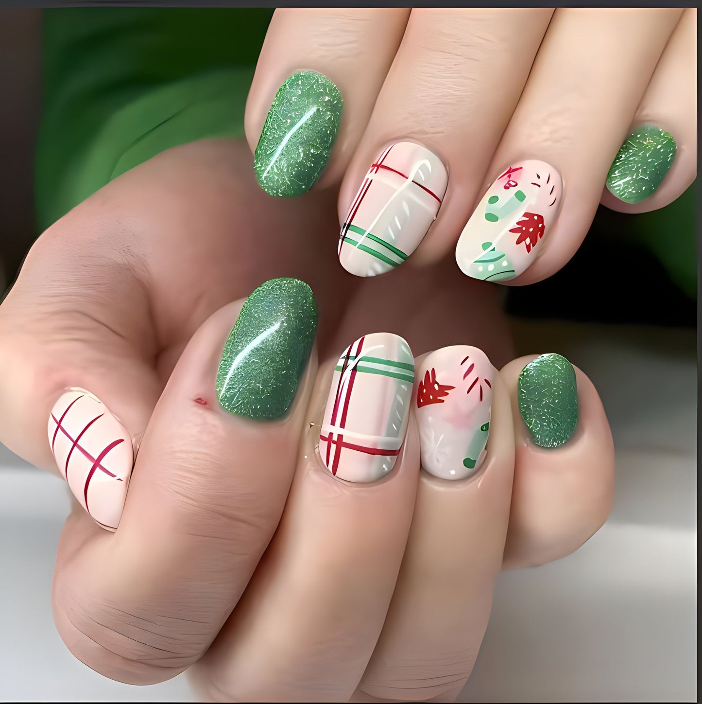 Festive Green and Cream Medium Oval Press On Nail Set with Glitter and Holiday Patterns