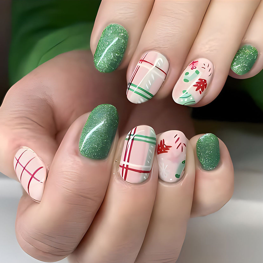 Festive Winter Wonderland Medium Oval Green and Pink Press On Nail Set with Glitter and Holiday Patterns