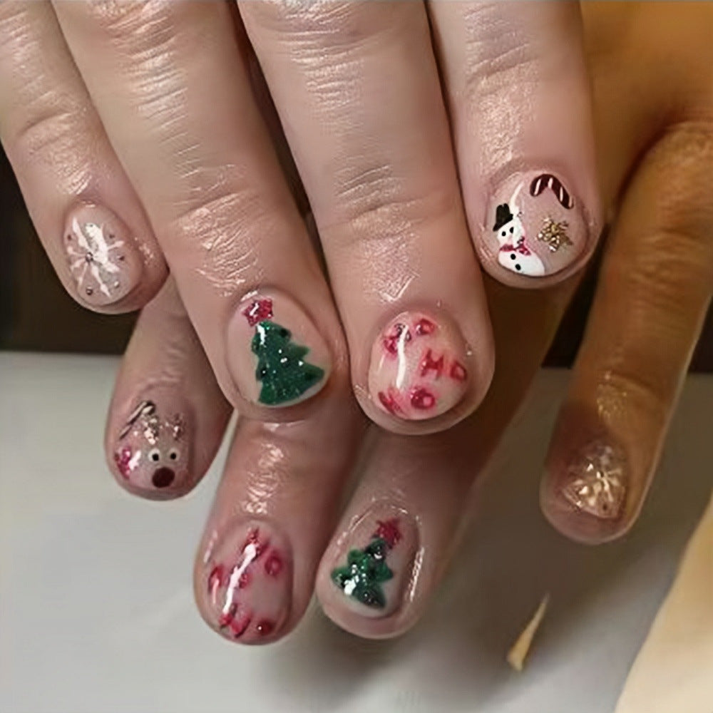 Festive Holiday Short Oval Green Red Glitter Nail Set with Cute Christmas Characters and Designs